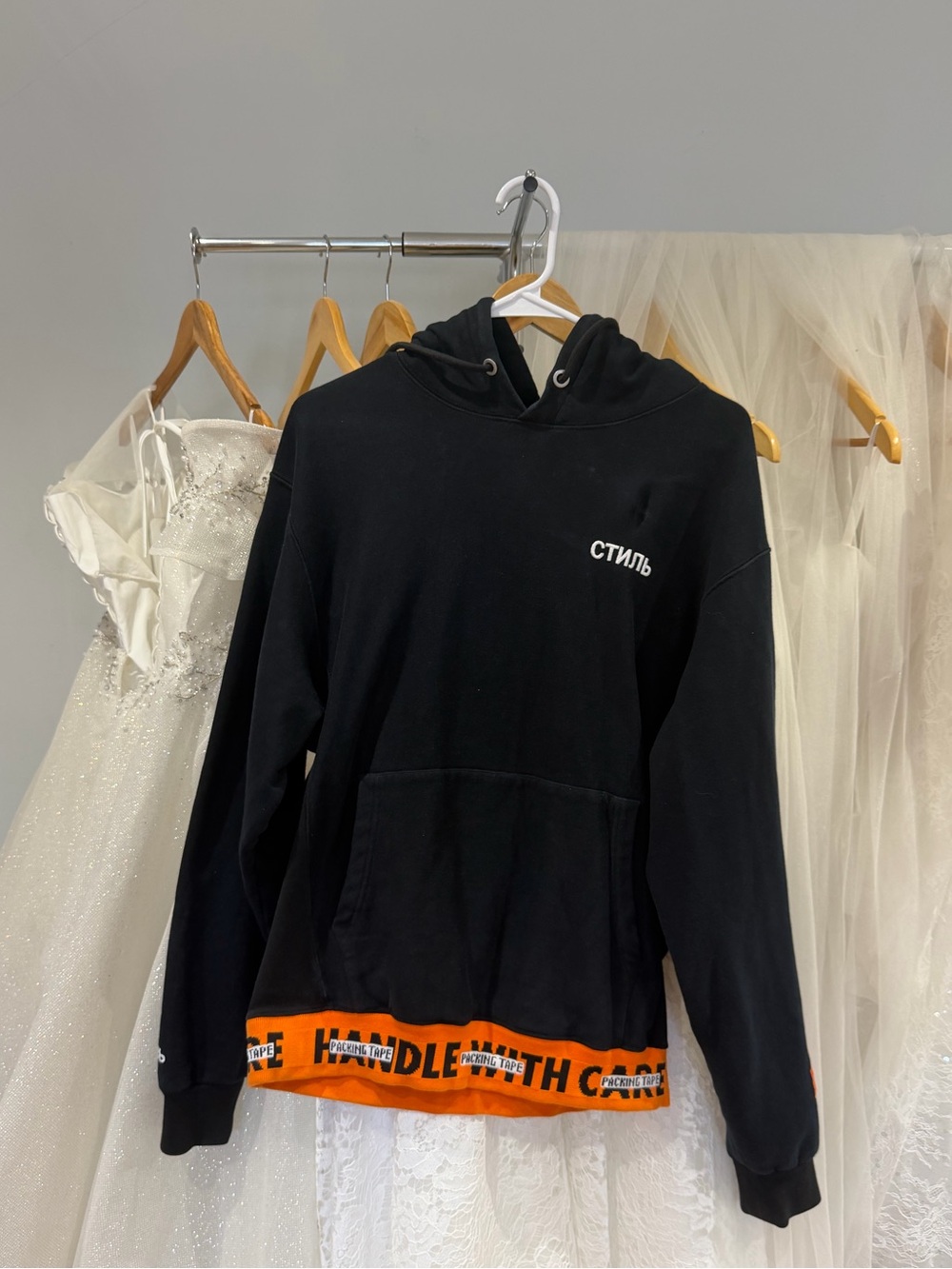 Heron Preston Black Hoodie with Orange Hem Detail